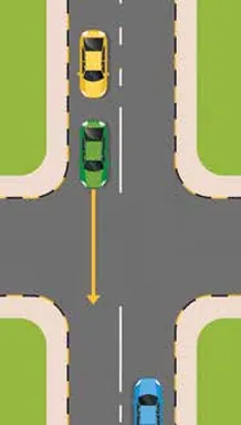 Blue car waiting on a main road to turn left at a junction with its wheels pointing straight ahead