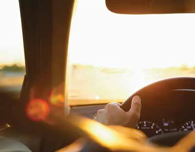 Driver’s view with low sun shining directly through the windscreen