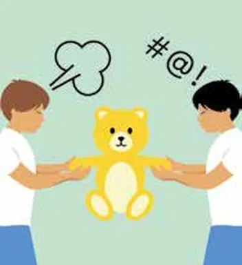 Two children fighting over a teddy bear