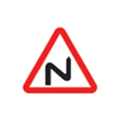 UAE road sign: Double bend, first to the right